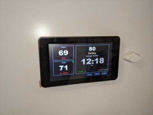 Front view of the Waiter ECC touchscreen mounted on the wall